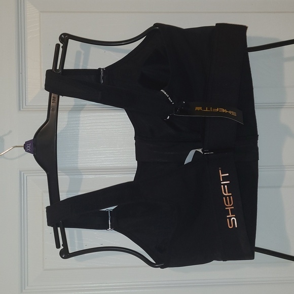 Black Sports Bra with Zipper Closure and Racerback Design - Picture 2 of 6